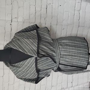 XL in size, black in bone belted short sleeve open cover